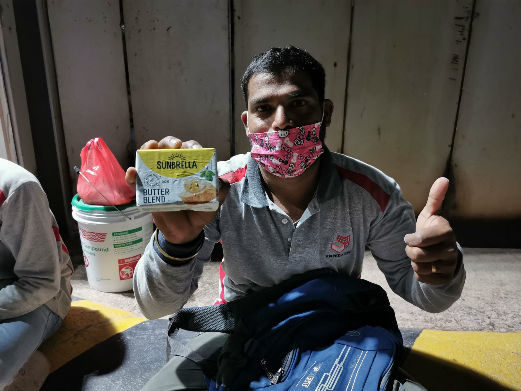 Foreign workers receiving food